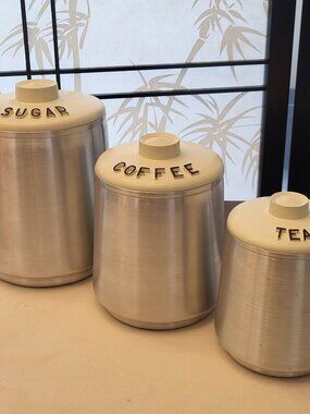 Set of 3 Vintage Kromex Kitchen Cannisters - Aluminum w/ Cream Lids